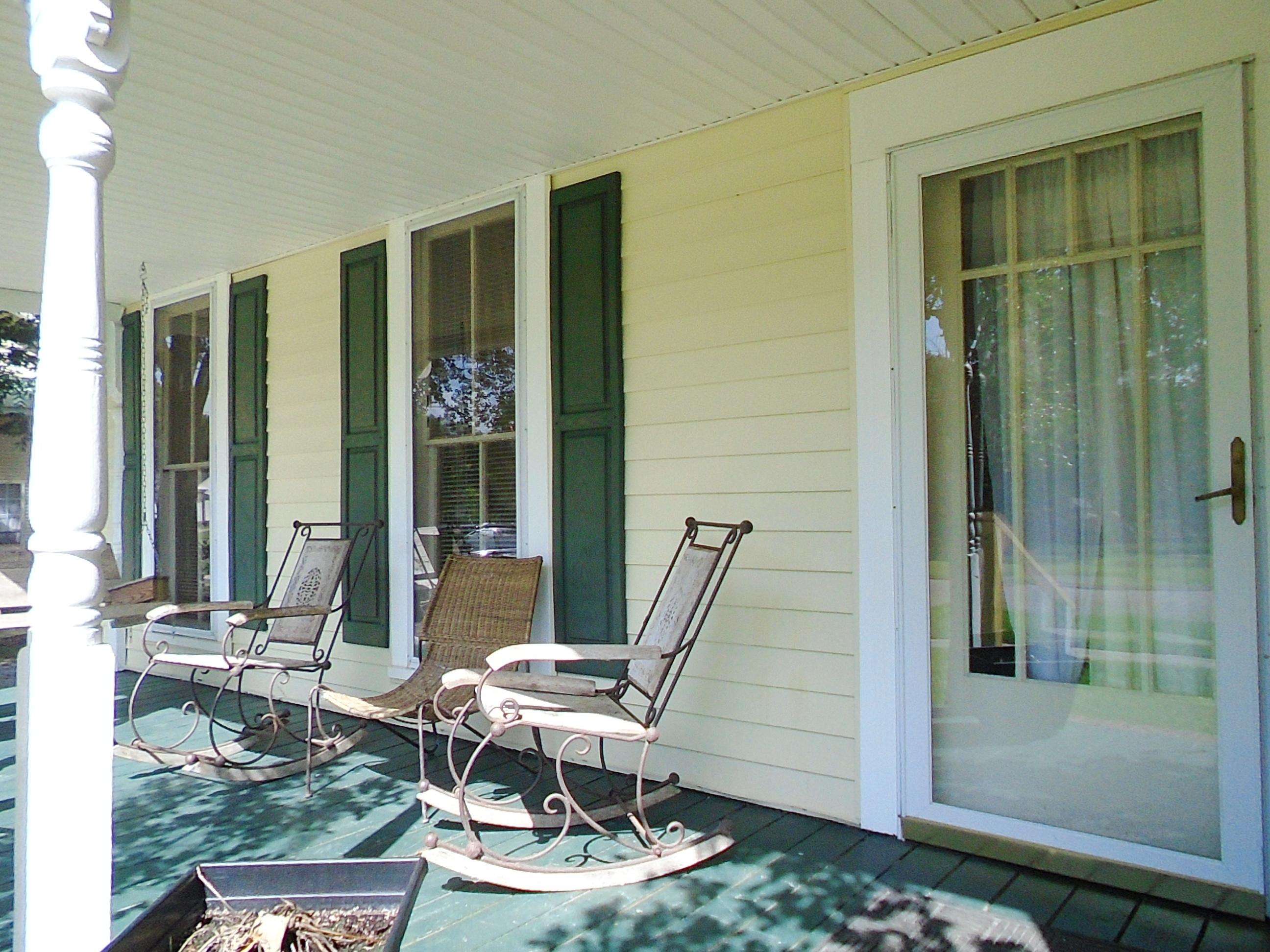 910 5th Street Florala, AL 36442 - Photo 12 of 34 a outdoor space with a couch and chairs