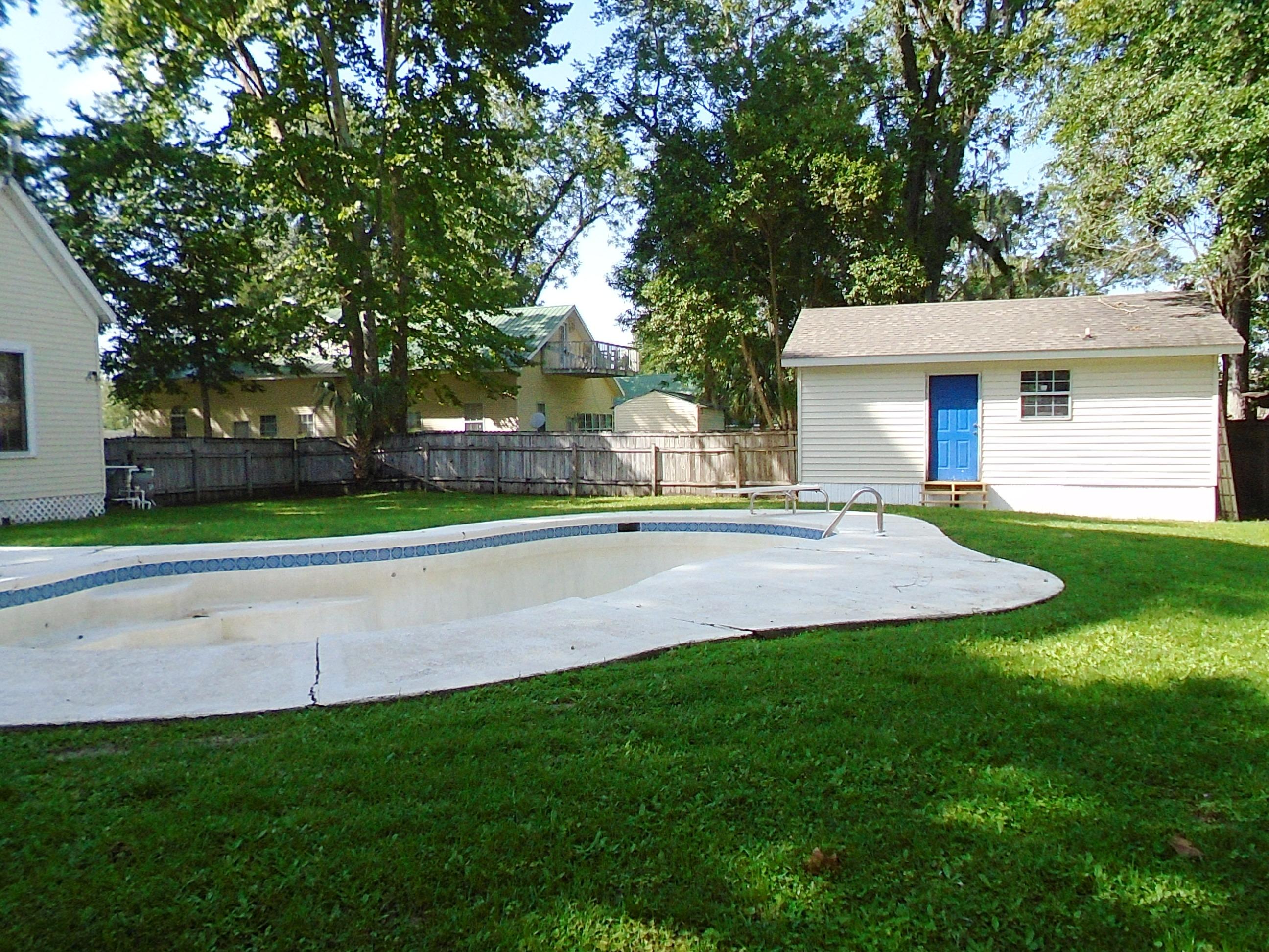 910 5th Street Florala, AL 36442 - Photo 20 of 34 a view of house with a yard