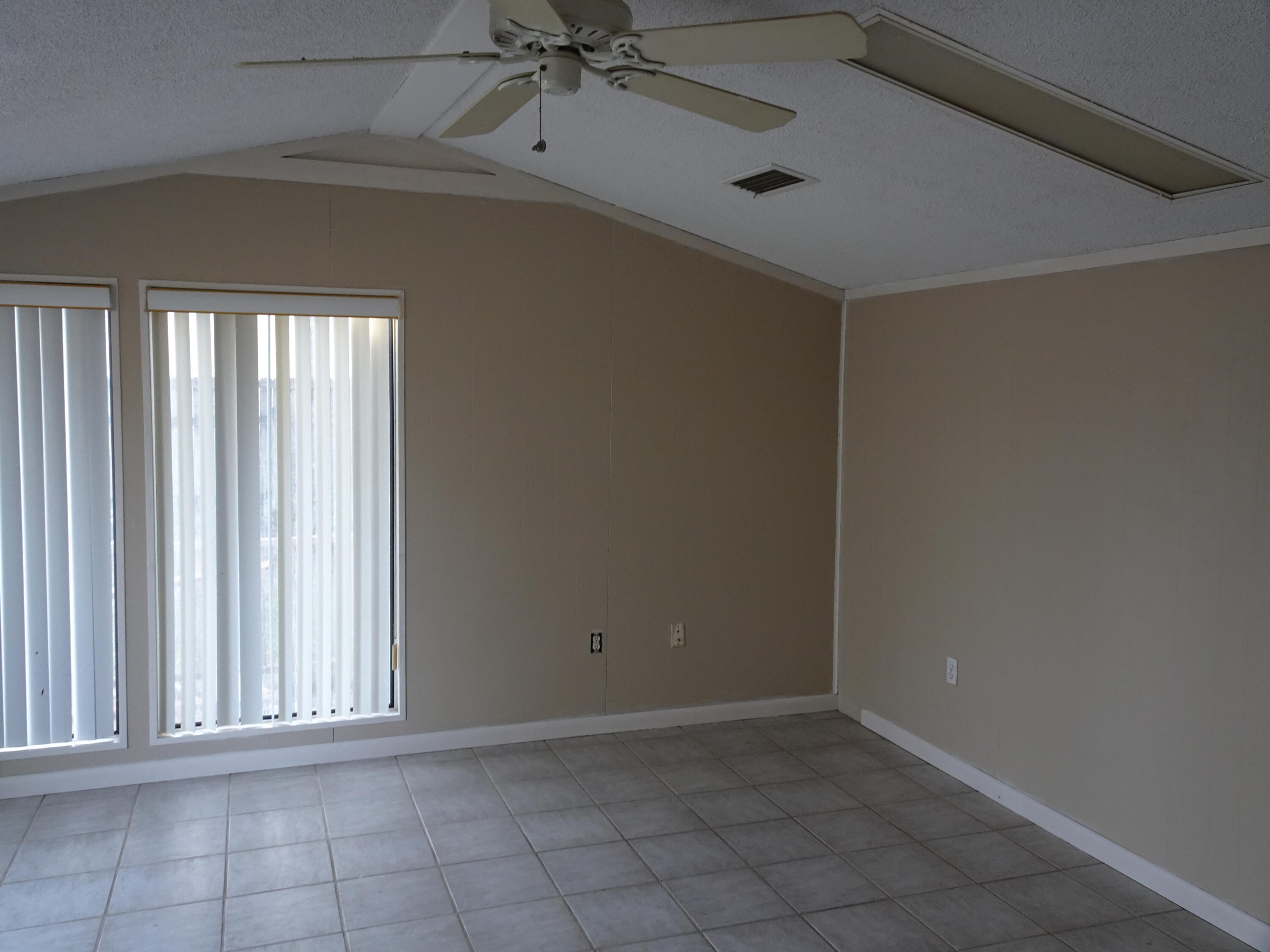 910 5th Street Florala, AL 36442 - Photo 28 of 34 a view of an empty room with a window