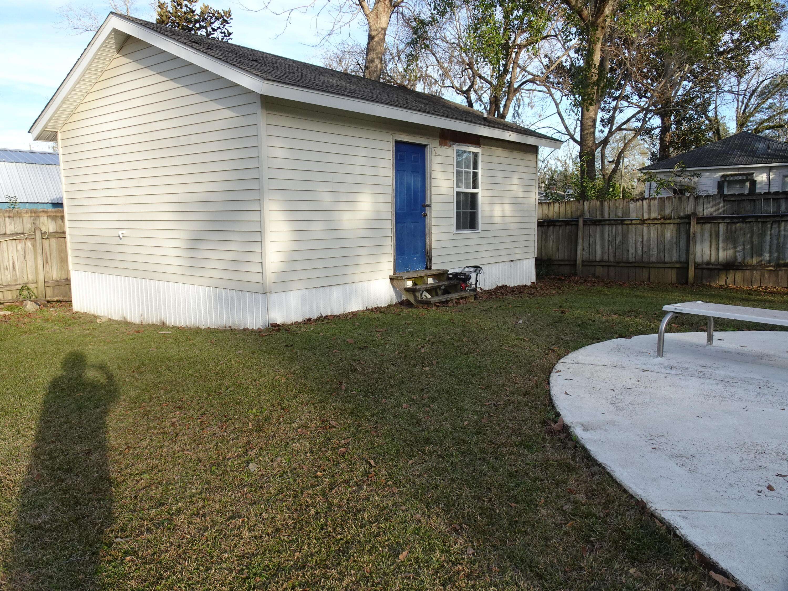 910 5th Street Florala, AL 36442 - Photo 32 of 34 a front view of a house with garden