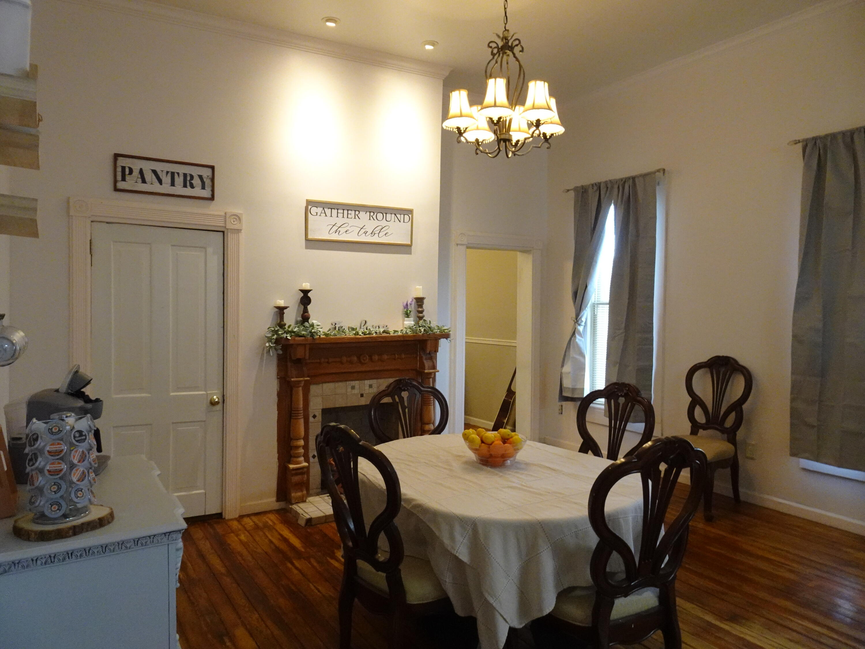 910 5th Street Florala, AL 36442 - Photo 5 of 34 a view of a dining room with furniture and chandelier