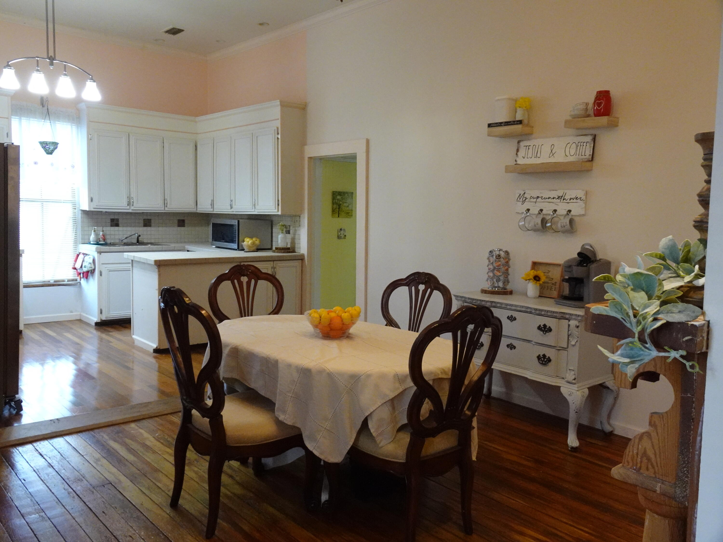 910 5th Street Florala, AL 36442 - Photo 6 of 34 a view of a dining room with furniture and wooden floor
