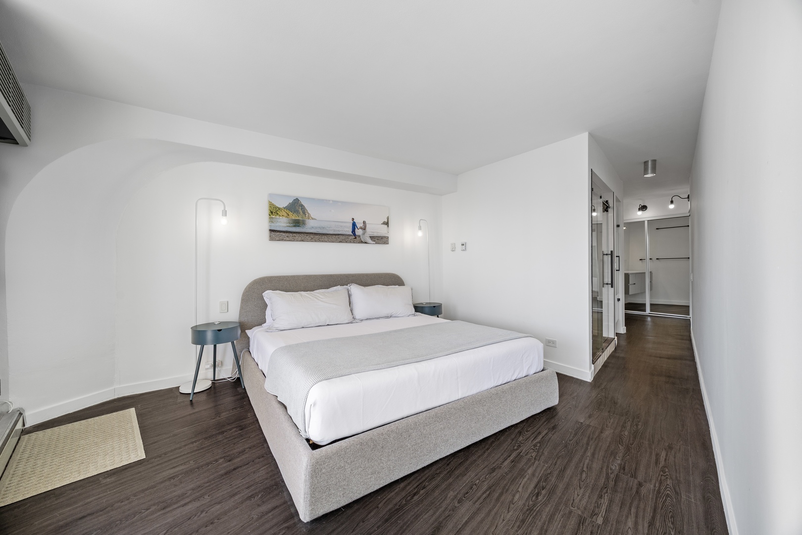 300 North State Street, Unit 5506 Chicago, IL 60654 - Photo 11 of 28 a large white bed in a white room