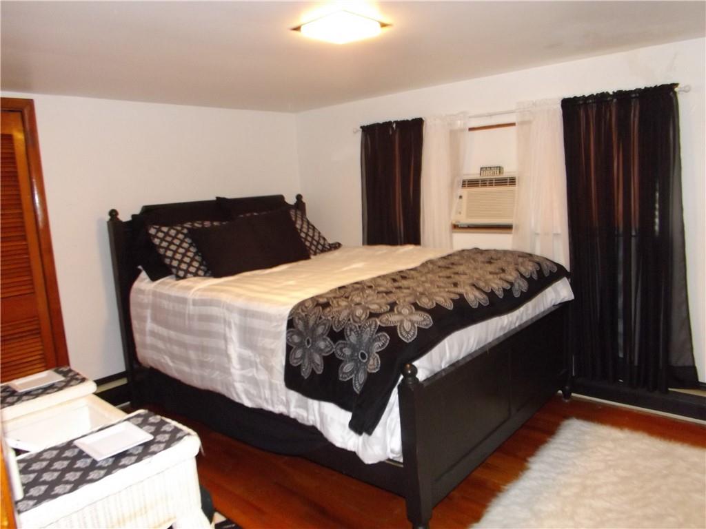 1641 Dime Road Vandergrift, PA 15690 - Photo 13 of 23 a bedroom with bed and walk in closet