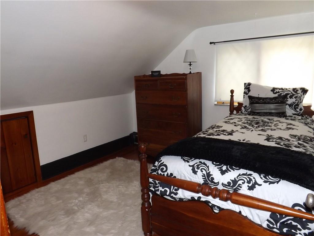 1641 Dime Road Vandergrift, PA 15690 - Photo 14 of 23 a bedroom with a bed and a dresser