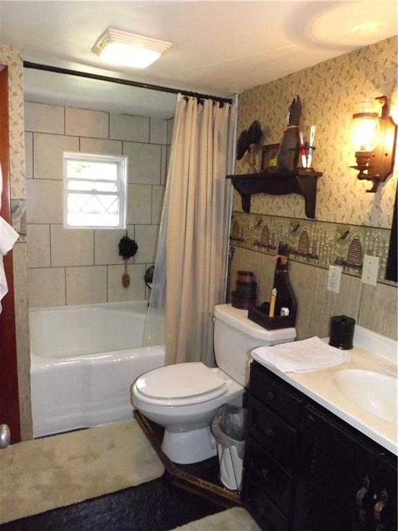 1641 Dime Road Vandergrift, PA 15690 - Photo 17 of 23 a bathroom with a sink a toilet and shower