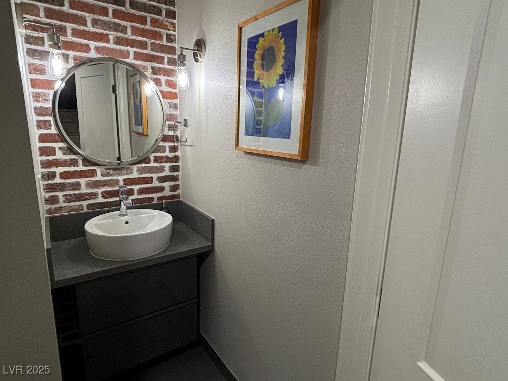 2784 Fountain Ridge Lane Henderson, NV 89074 - Photo 18 of 37 Bathroom with vanity and a textured wall