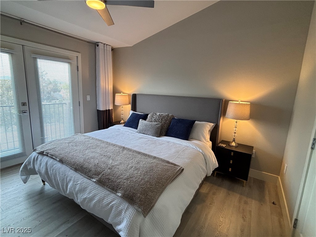 2784 Fountain Ridge Lane Henderson, NV 89074 - Photo 29 of 37 Bedroom with wood finished floors, access to outside, ceiling fan, and french doors