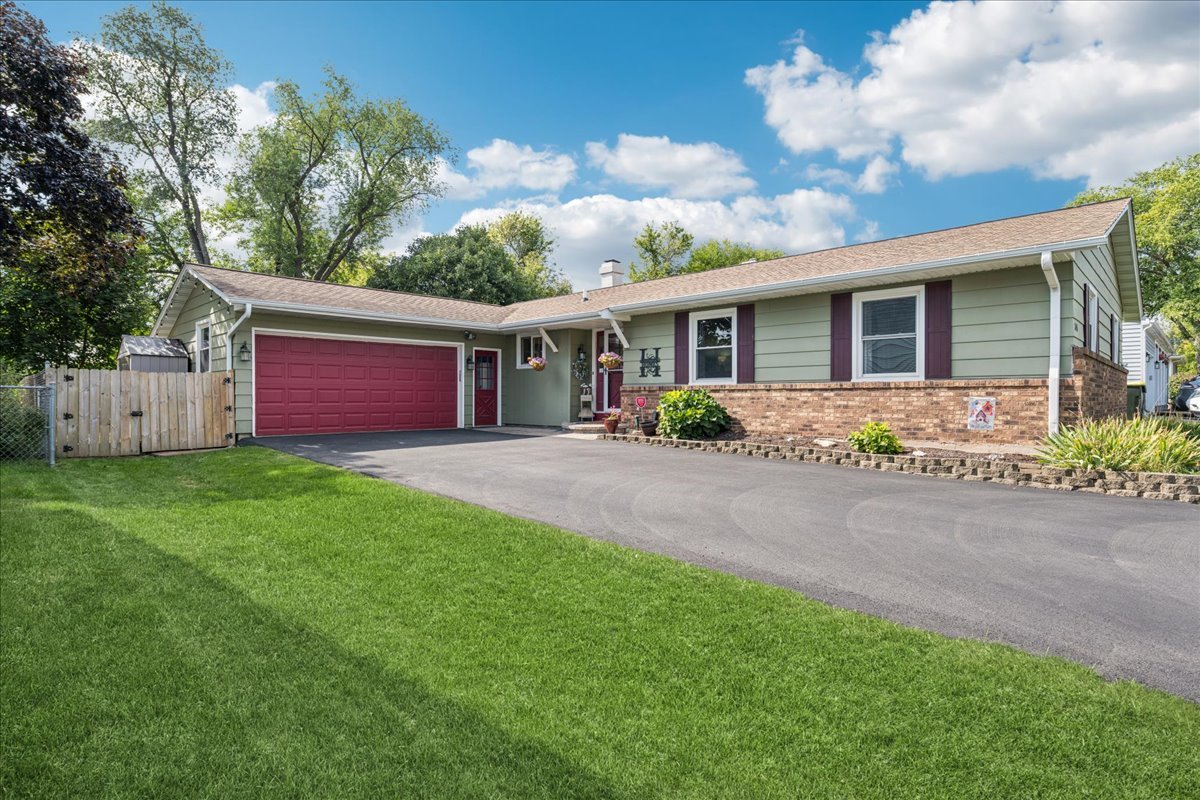 305 Pearl Street Cary, IL 60013 - Photo 1 of 25 a front view of house with yard and green space