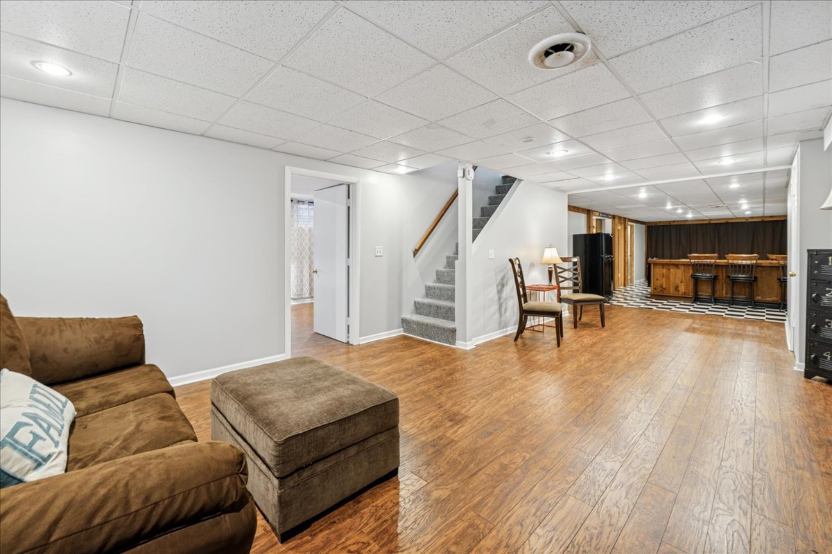 305 Pearl Street Cary, IL 60013 - Photo 14 of 25 a living room with furniture and a wooden floor