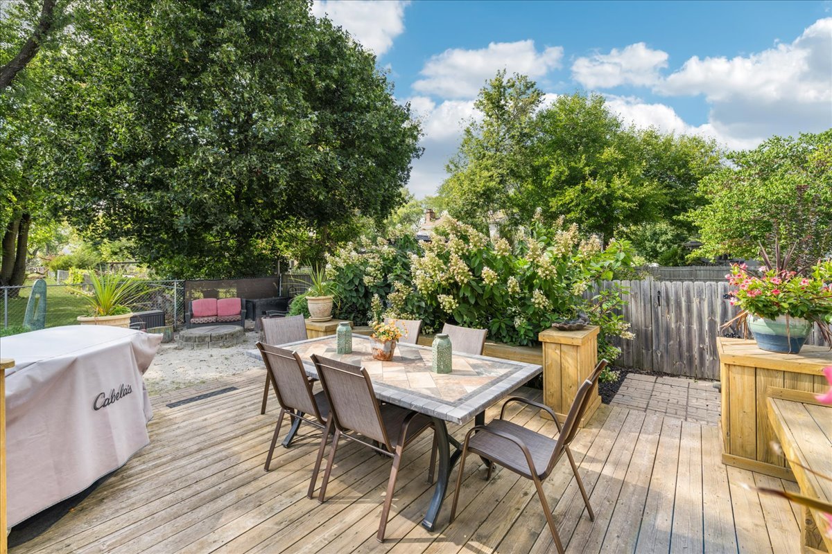 305 Pearl Street Cary, IL 60013 - Photo 20 of 25 a view of a dinning table and chairs in the patio