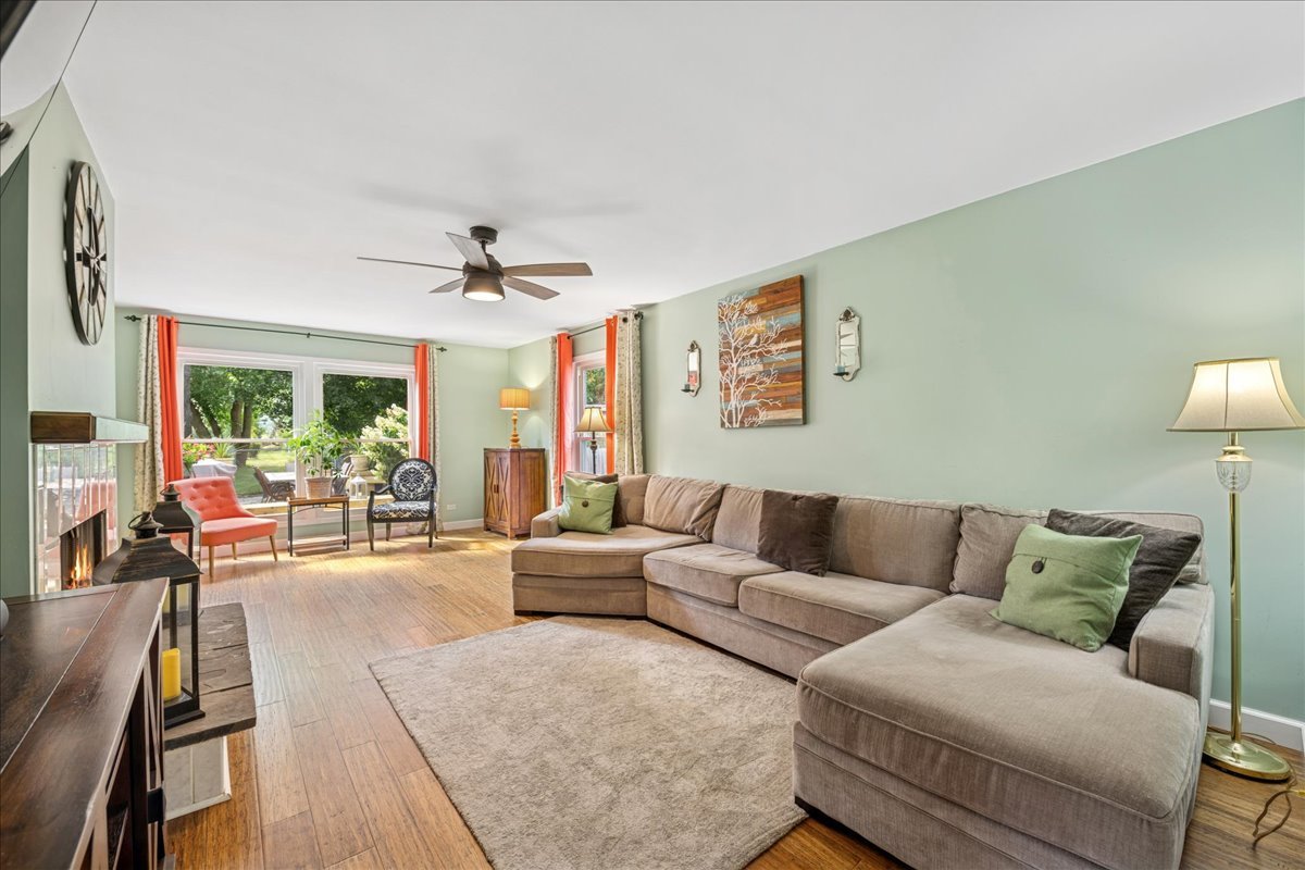 305 Pearl Street Cary, IL 60013 - Photo 8 of 25 a living room with furniture and a table