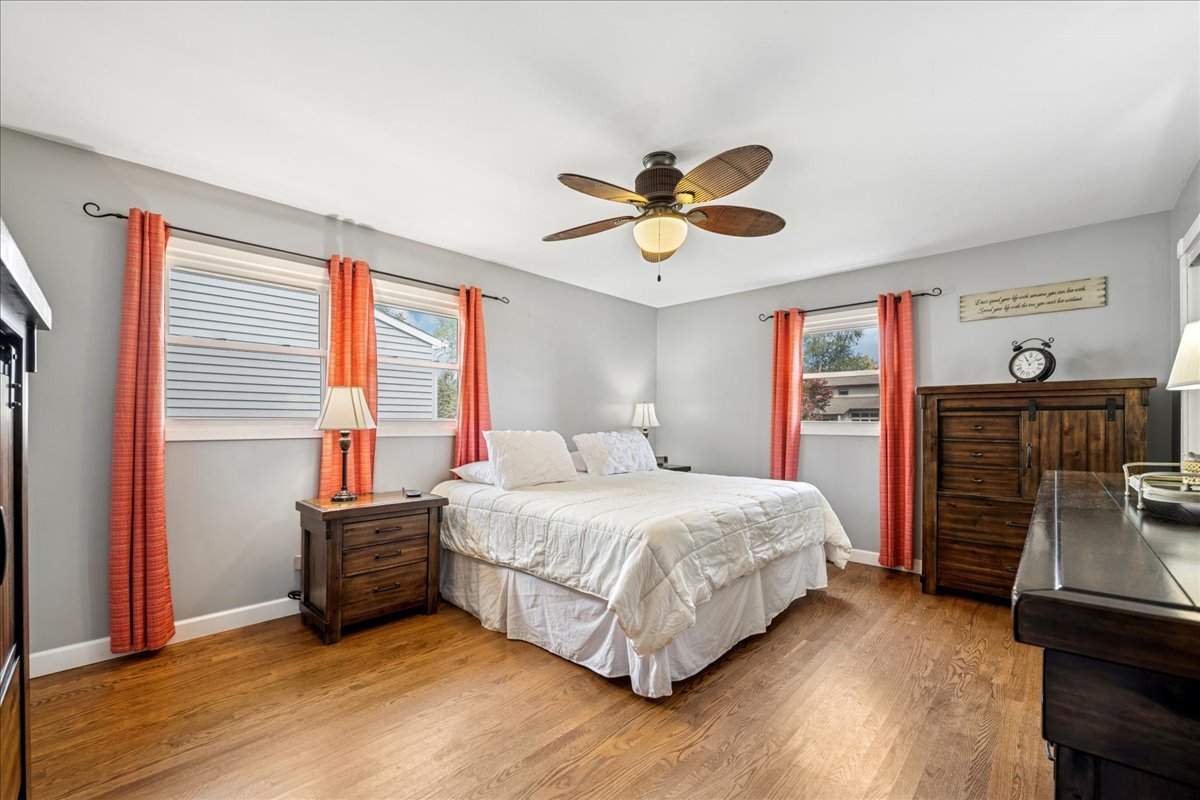 305 Pearl Street Cary, IL 60013 - Photo 9 of 25 a bedroom with a bed and a walk in closet