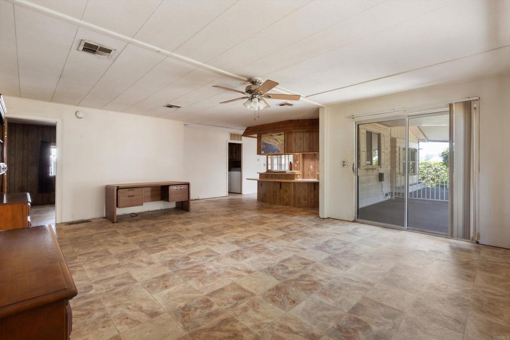 1175 La Moree Road, Unit 10 San Marcos, CA 92078 - Photo 18 of 40 a view of a kitchen with a sink and a refrigerator
