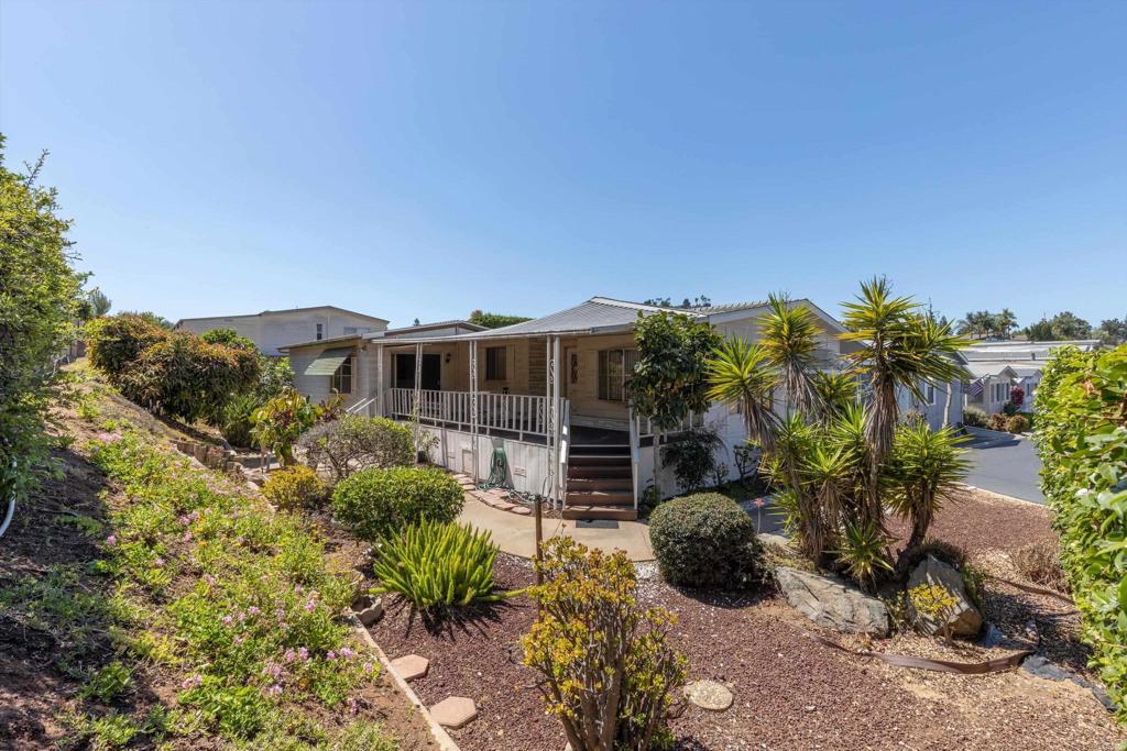 1175 La Moree Road, Unit 10 San Marcos, CA 92078 - Photo 2 of 40 a view of house with yard and sitting area