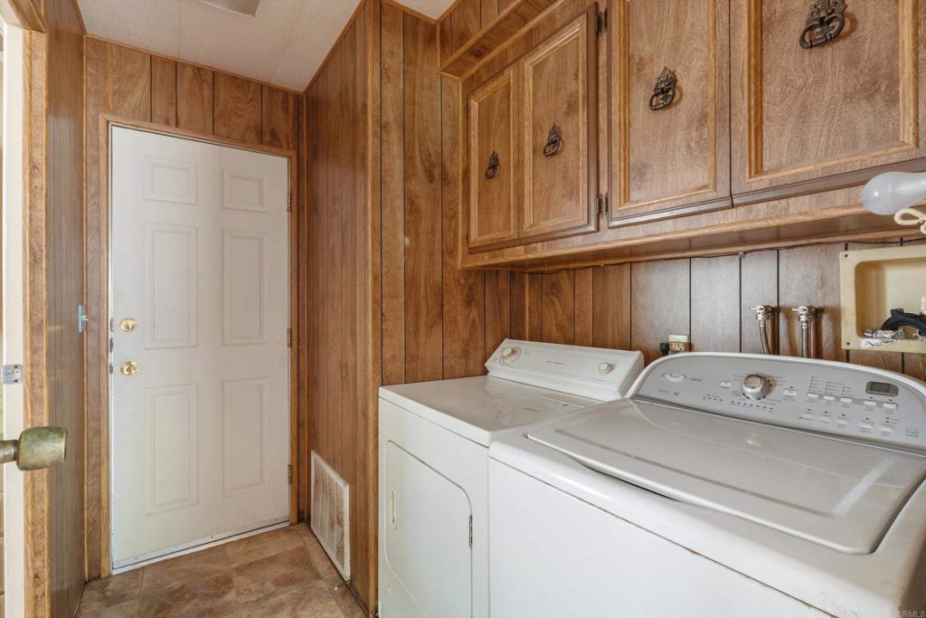 1175 La Moree Road, Unit 10 San Marcos, CA 92078 - Photo 28 of 40 a utility room with dryer and washer