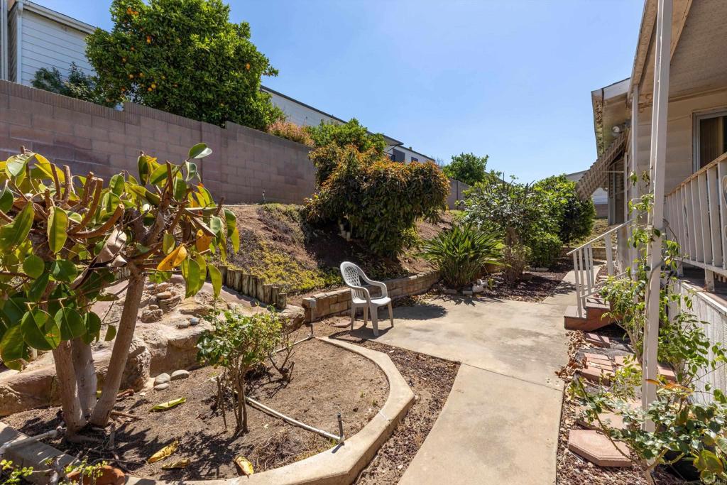 1175 La Moree Road, Unit 10 San Marcos, CA 92078 - Photo 3 of 40 a view of a backyard with plants