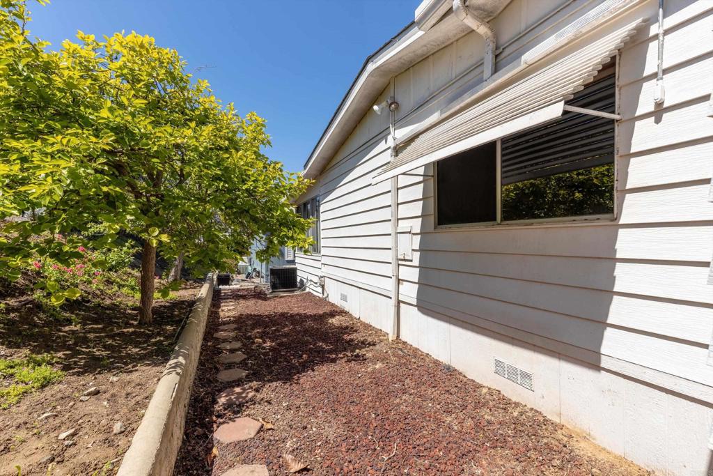 1175 La Moree Road, Unit 10 San Marcos, CA 92078 - Photo 32 of 40 a view of a backyard with pathway