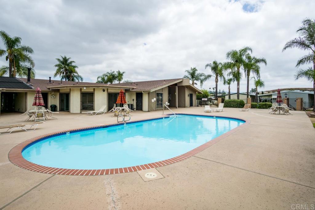 1175 La Moree Road, Unit 10 San Marcos, CA 92078 - Photo 36 of 40 an outdoor space with swimming pool and furniture