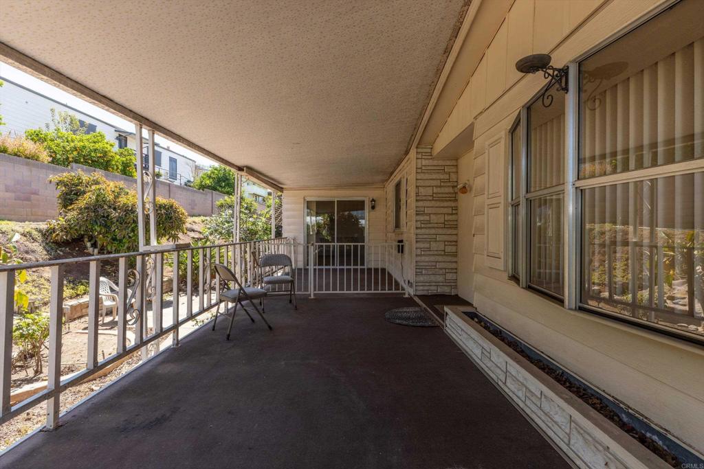 1175 La Moree Road, Unit 10 San Marcos, CA 92078 - Photo 5 of 40 a view of a balcony with chairs