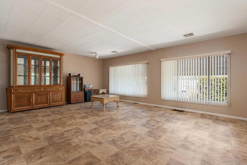 1175 La Moree Road, Unit 10 San Marcos, CA 92078 - Photo 8 of 40 a view of an empty room with a window