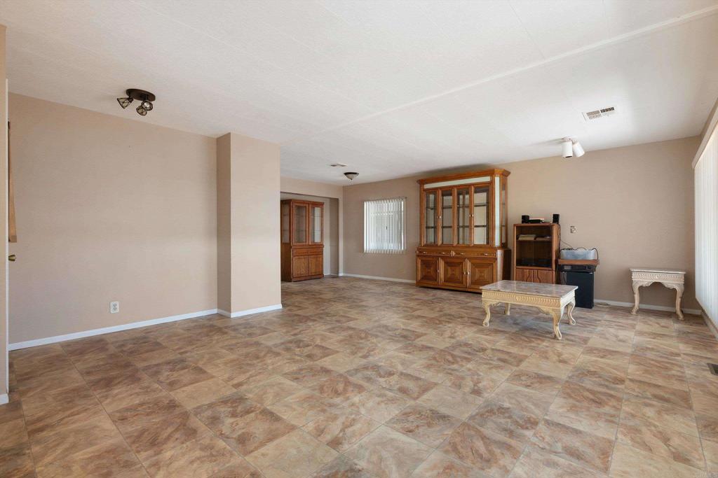 1175 La Moree Road, Unit 10 San Marcos, CA 92078 - Photo 9 of 40 a view of livingroom with a furniture and closet