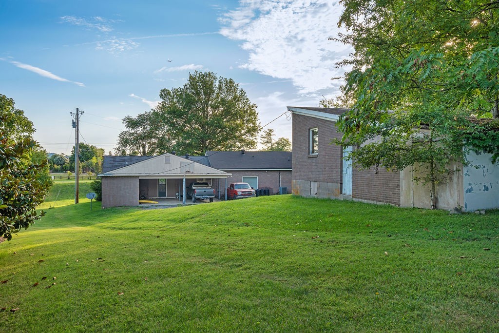 4115 Murfreesboro Road Franklin, TN 37067 - Photo 11 of 31 a house with a tree in front of the house