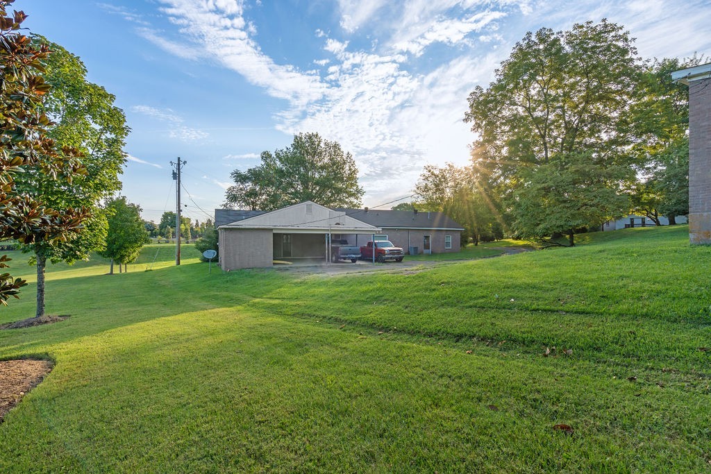 4115 Murfreesboro Road Franklin, TN 37067 - Photo 12 of 31 a front view of a house with garden