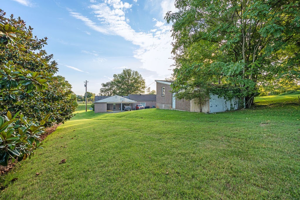 4115 Murfreesboro Road Franklin, TN 37067 - Photo 10 of 31 a view of a house with a yard