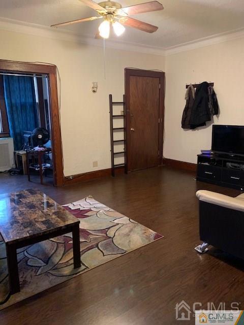 78 Norman Road Newark, NJ 07106 - Photo 3 of 9 a living room with furniture and a rug