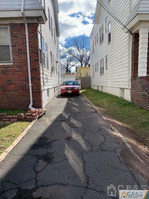 78 Norman Road Newark, NJ 07106 - Photo 6 of 9 a view of a house with a yard