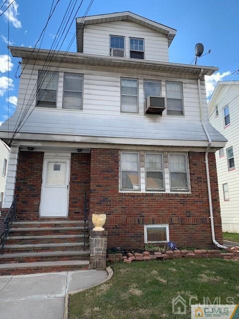 78 Norman Road Newark, NJ 07106 - Photo 7 of 9 a front view of a house with a yard
