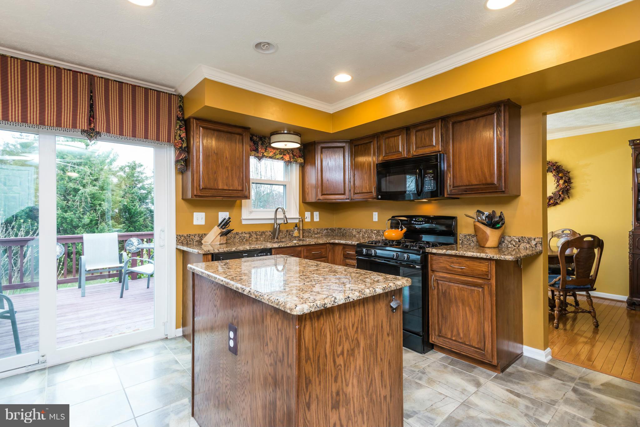 453 Manor Road Aberdeen, MD 21001 - Photo 8 of 28 Kitchen w/sliders to deck