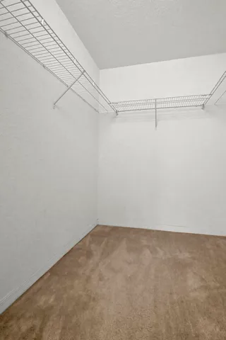 a view of a room with racks on the wall