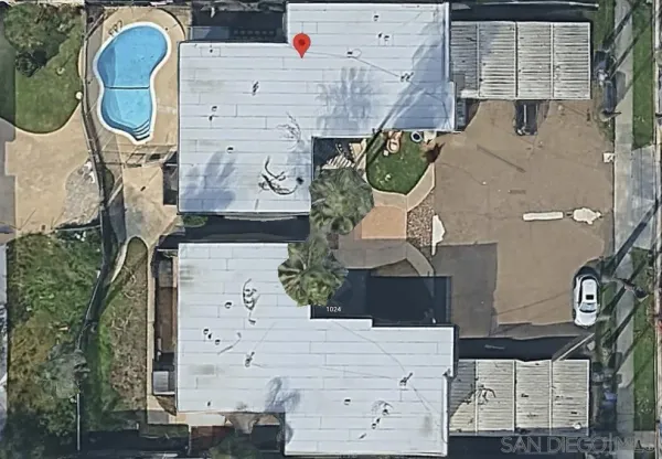 an aerial view of a highlighted house