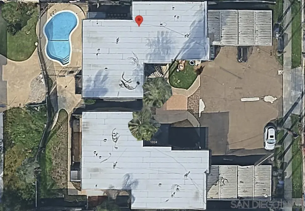 an aerial view of a highlighted house