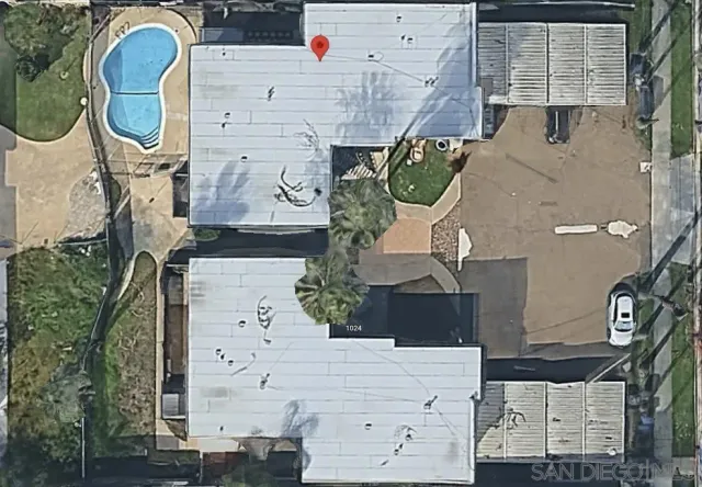 an aerial view of a highlighted house