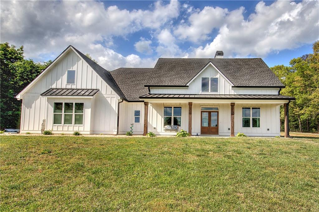 613 Nebo Road Dallas, GA 30157 - Photo 1 of 1 a front view of a house with a yard