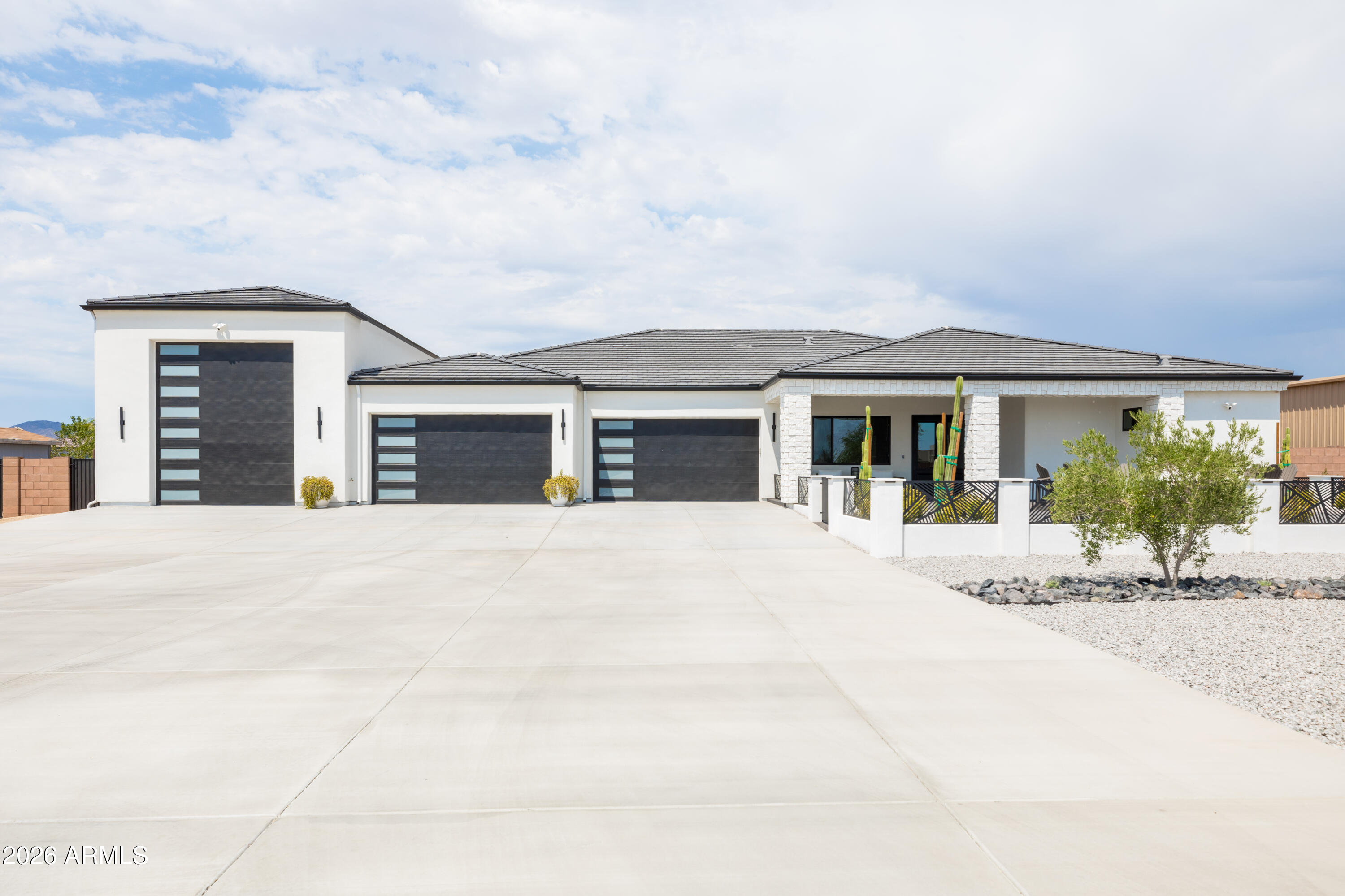 front view of a house with a yard
