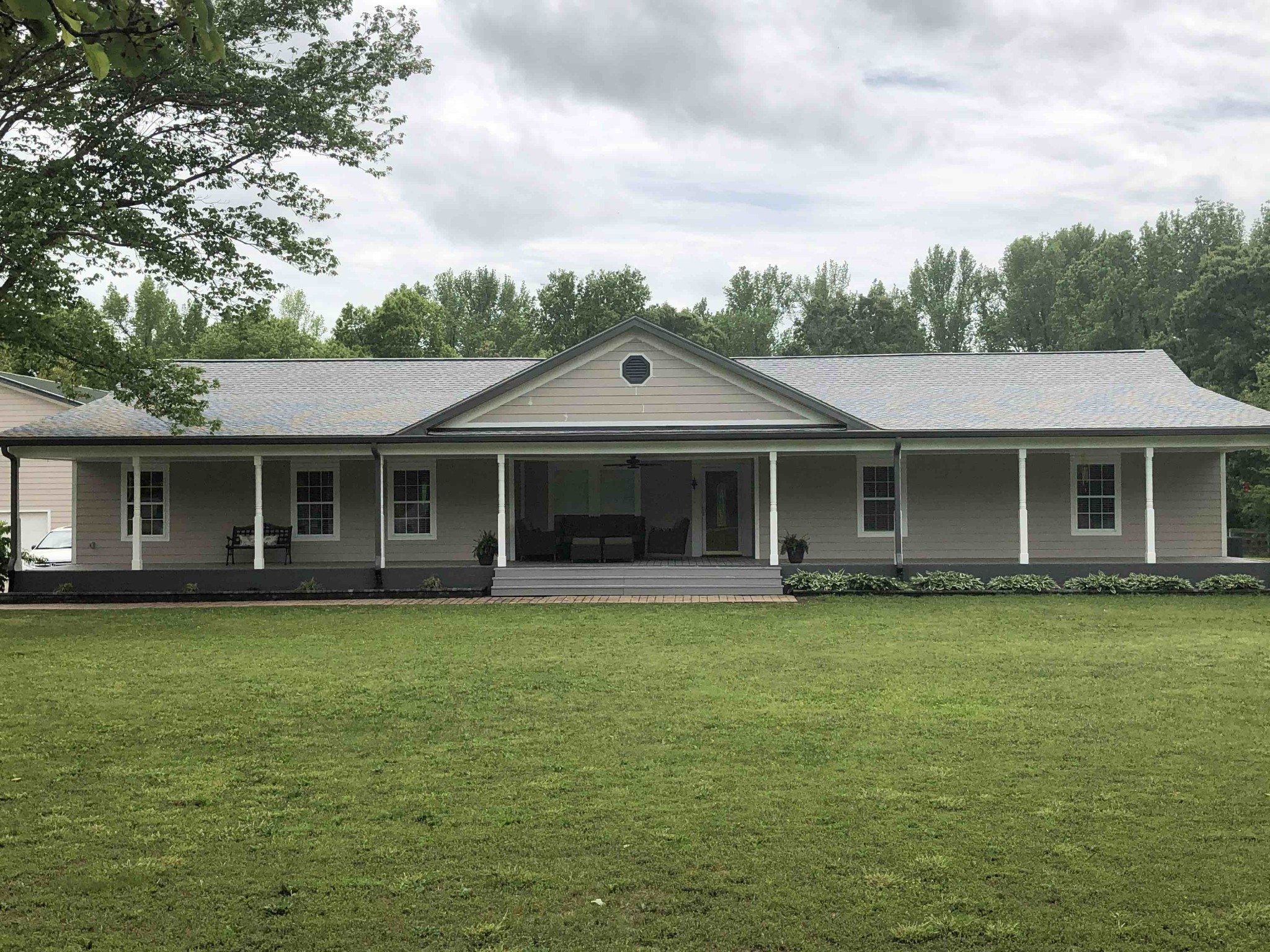 580 Pruett Road Dickson, TN 37055 - Photo 2 of 46 a front view of a house with a garden