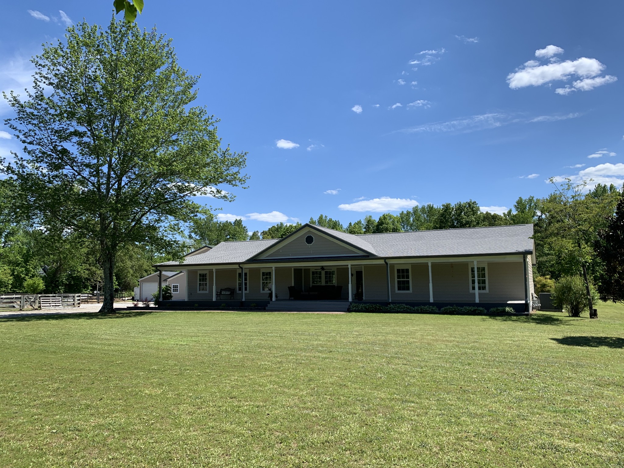580 Pruett Road Dickson, TN 37055 - Photo 3 of 46 a front view of a house with a garden