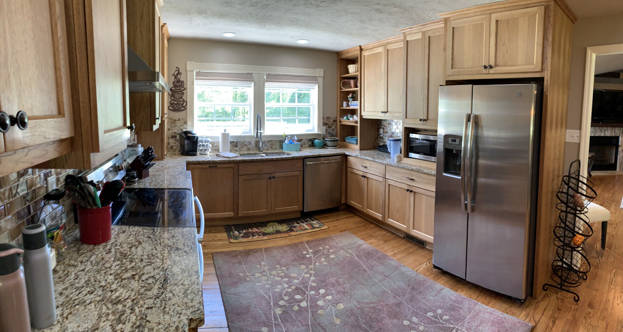 580 Pruett Road Dickson, TN 37055 - Photo 6 of 46 a kitchen with stainless steel appliances granite countertop a refrigerator sink and cabinets