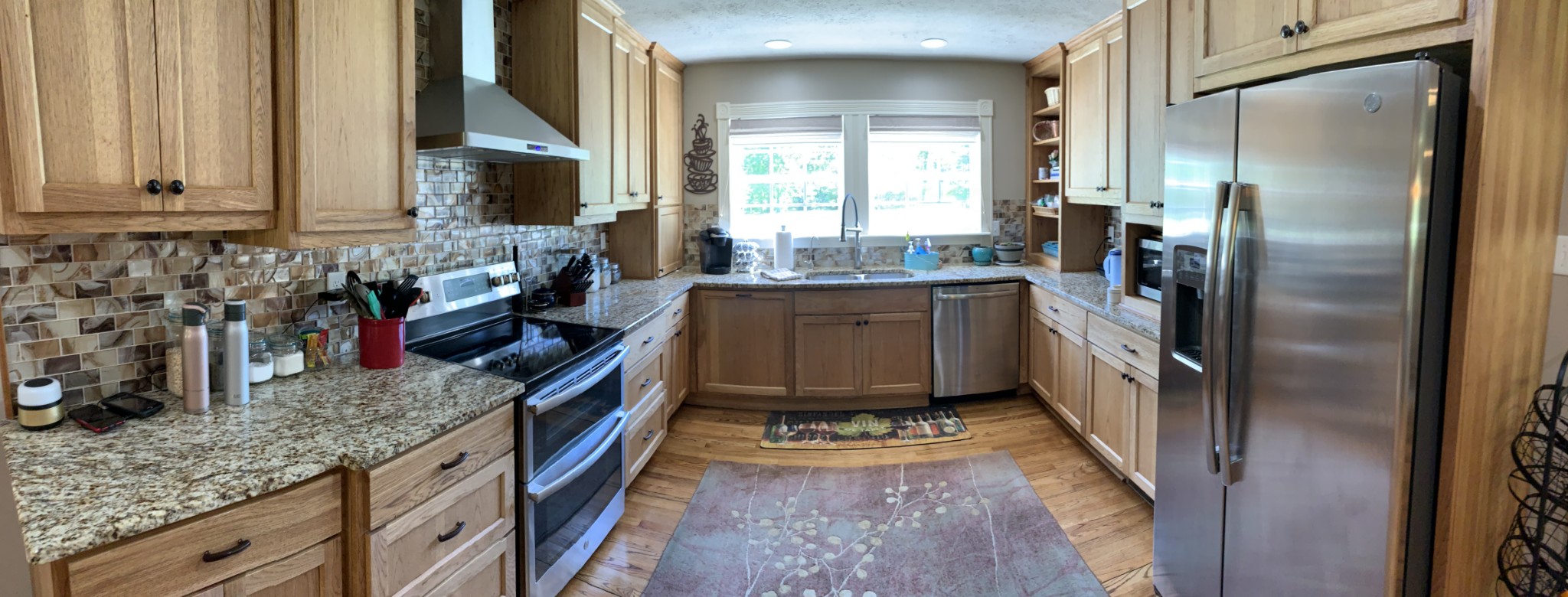 580 Pruett Road Dickson, TN 37055 - Photo 8 of 46 a kitchen with stainless steel appliances granite countertop a sink stove and refrigerator