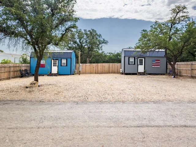 a house with trees in front of it