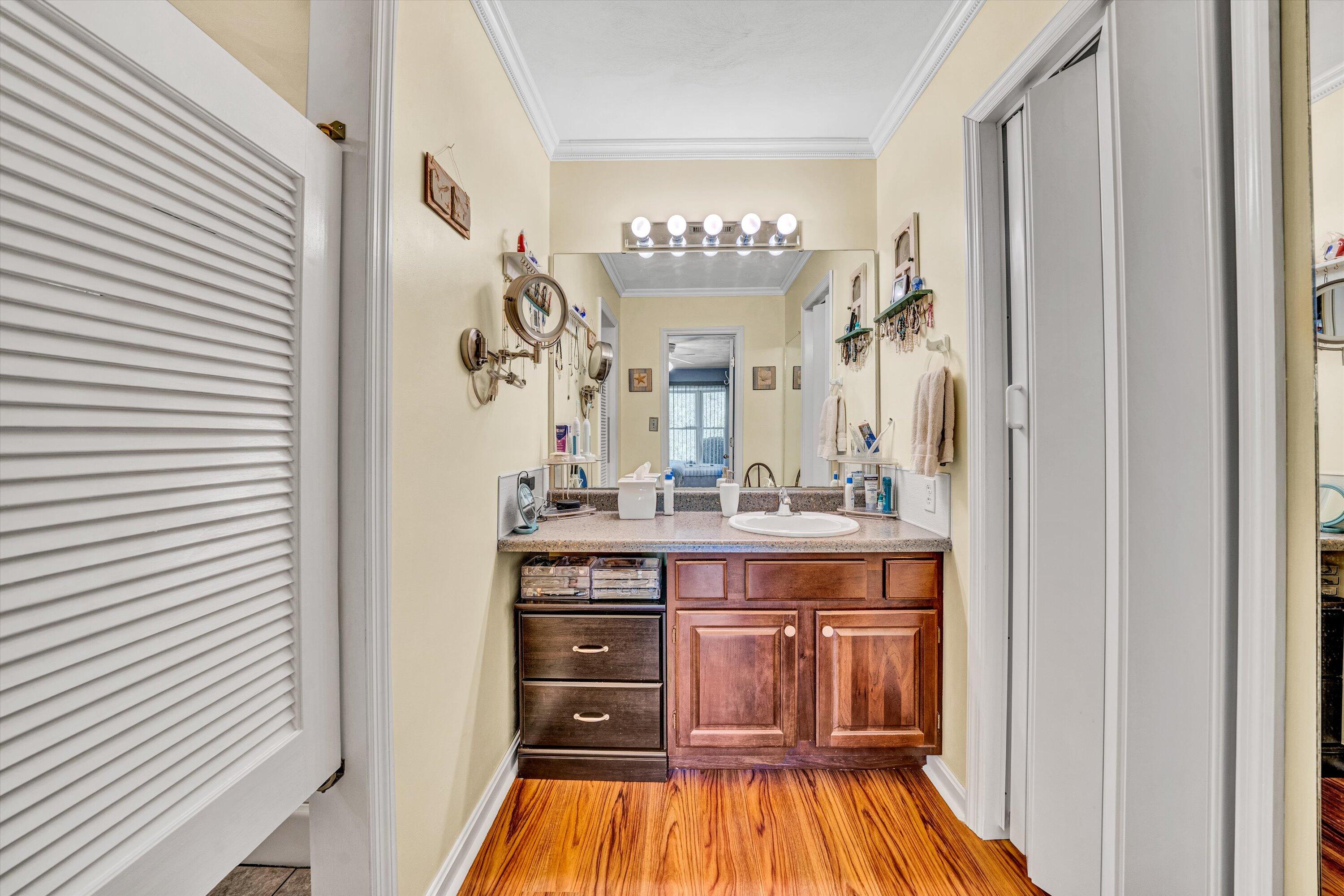 1033 Annie Bell Road Blue Ridge, VA 24064 - Photo 29 of 46 a spacious bathroom with a sink and a mirror