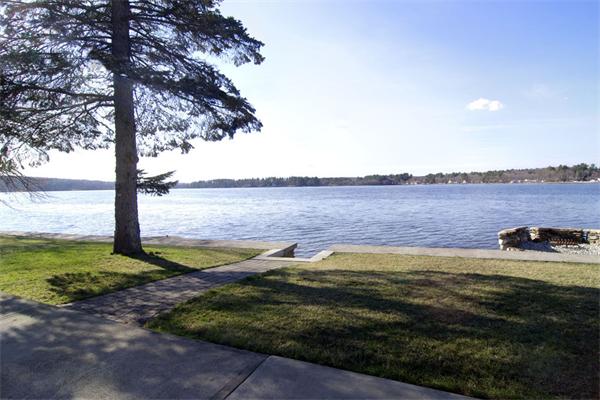 170 Red Gable Road East Brookfield, MA 01515 - Photo 1 of 30 a view of a lake with a big yard