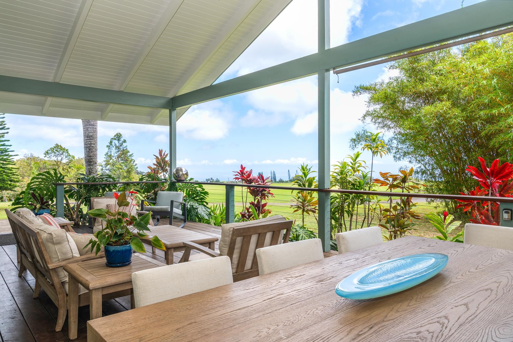 1949 West Kuiaha Road Haiku, HI 96708 - Photo 31 of 49 a view of a balcony with chairs and a potted plant