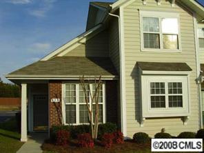 723 Shellstone Place, Unit 723 Fort Mill, SC 29708 - Photo 1 of 7 a front view of a house with a yard