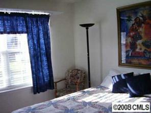 723 Shellstone Place, Unit 723 Fort Mill, SC 29708 - Photo 5 of 7 a bedroom with a bed and a window