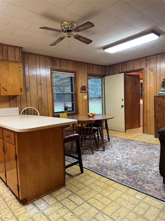 904 Uncas Street Logansport, LA 71049 - Photo 15 of 28 Kitchen dining area, looking at back door and door to pantry/laundry room that leads to the carport